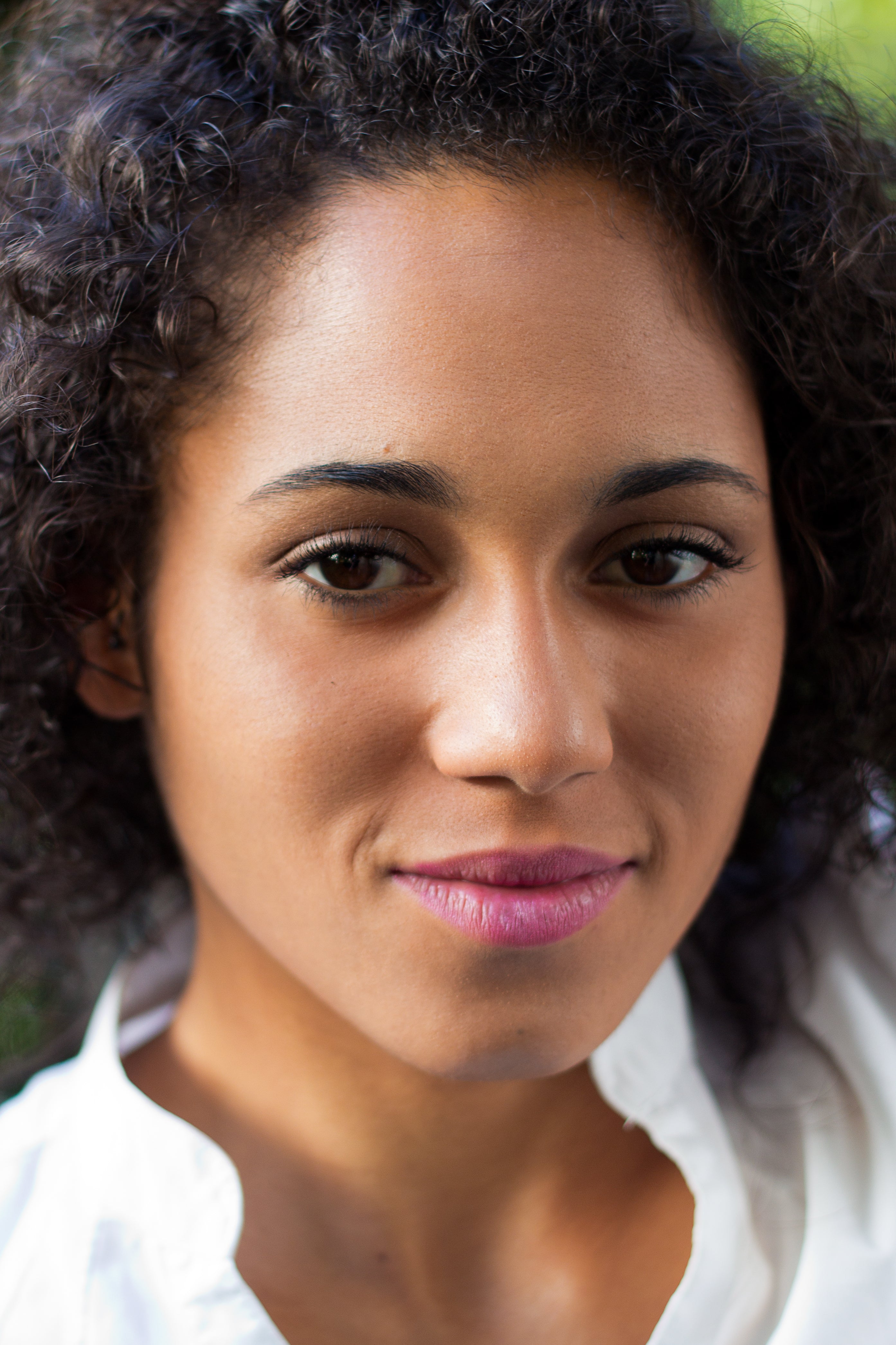 files/portrait-black-woman-with-curly-hair.jpg